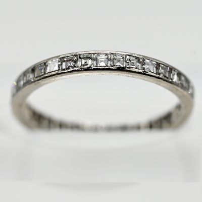 Los Nr. 111 Memoryring mit 34 Diamanten im Carréschliff, zus. ca. 1,36 ct, 80er Jahre