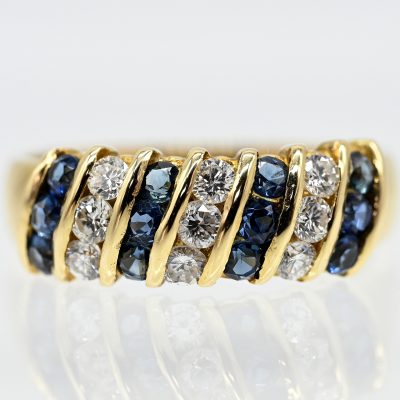 Los Nr. 136 Ring mit 12 Saphiren und 9 Brillanten, zus. ca. 0,27 ct, 80er Jahre