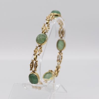 Los Nr. 015 Goldenes Gliederarmband mit 5 Amazonit-Cabochons, Goldschmiedearbeit, 70er Jahre