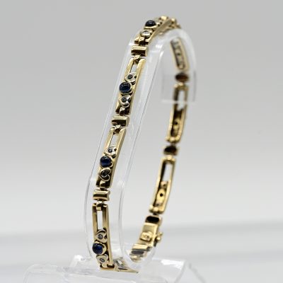 Los Nr. 193 Armband mit 8 Saphir Cabochons und 16 Melée Brillanten, zus. ca. 0,1 ct, 80er Jahre