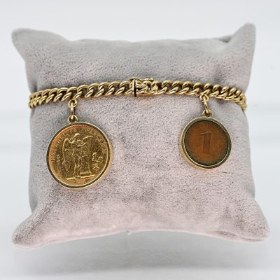 Los Nr. 083 Goldenes Rundpanzerarmband mit 2 Anhängern: 1 goldene Münze 20 Francs 1897 und 1 Pfennig 1970er Jahre