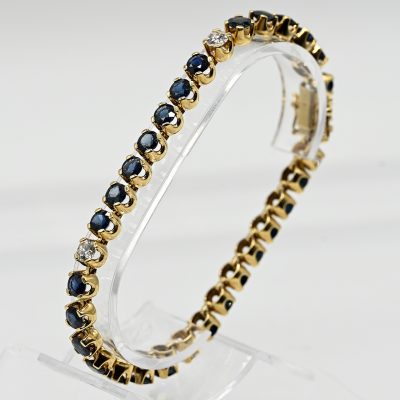 Los Nr. 095 Tennisarmband mit 29 hochfeinen Saphiren und 4 Brillanten, zus. ca. 1,16 ct, Juwelierarbeit, 1990er Jahre