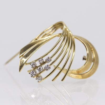 Los Nr. 016 Kometen-Brosche mit 7 Brillanten, zus. ca. 0,3 ct, 1970er Jahre