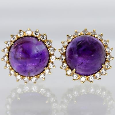 Los Nr. 182 Paar Ohrclips mit Amethyst-Cabochon und zus. ca. 38 Brillanten, zus. ca. 0,75 ct, Juwelierarbeit, 80er Jahre