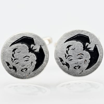 Los Nr. 019 Paar Manschettenknöpfe mit Vexierbild, Goldschmiedearbeit, N. M., 21. Jh.