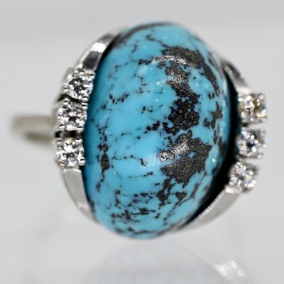 Los Nr. 059 Ring mit Türkis-Cabochon und 6 Brillanten, zus. ca. 0,3 ct, 70er Jahre