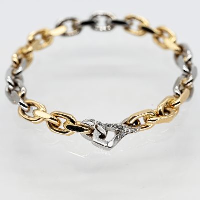 Los Nr. 077 Massives Armband in Bi-Color und 10 kleinen Brillanten, Goldschmiedearbeit, 80er Jahre
