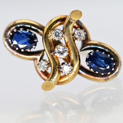 Los Nr. 089 Brosche mit 2 blauen Farbsteinen und 5 Altschliff-Diamanten, zus. ca. 0,3 ct, um 1900